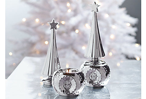Portacandelita Starlite

Brillante y elegante portavela de cerámica con acabado metálico. La parte de arriba simula la punta del árbol de navidad, la candelita se coloca en la base.