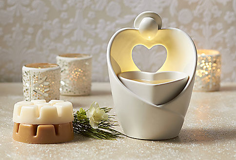 Difusor Eléctrico ScentGlow® Corazón

De cerámica esmaltada, este delicado difusor liberará una exquisita y continua fragancia. Utilízalo con pastillas Scent Plus® Melts o aceite esencial que se vende por separado.